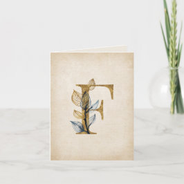 Monogramm aus Gold und Schwarz mit Blätter
