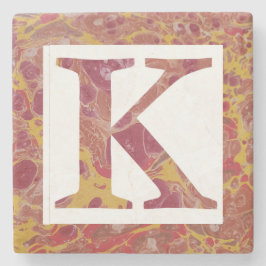 Monogramm aus rotem und gelbem Stein Steinuntersetzer