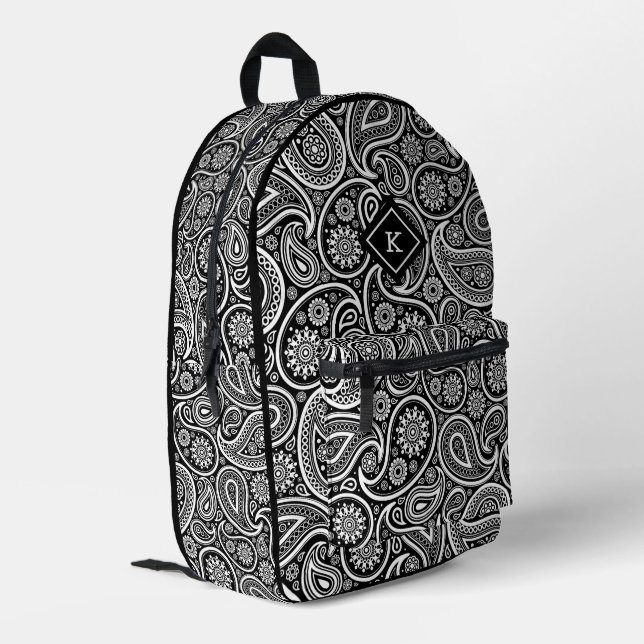 Monogramm aus schwarzweißem Paisley Bedruckter Rucksack (Rückseitige Ecke links)