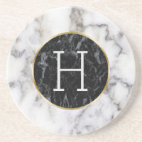 Monogramm aus weißem und schwarzem Zirkel