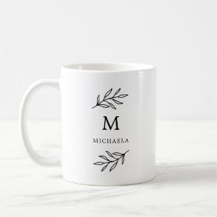 Monogramm der minimalen botanischen Blätter Schwar Kaffeetasse