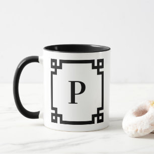Monogramm der weißen und schwarzen griechischen Sc Tasse