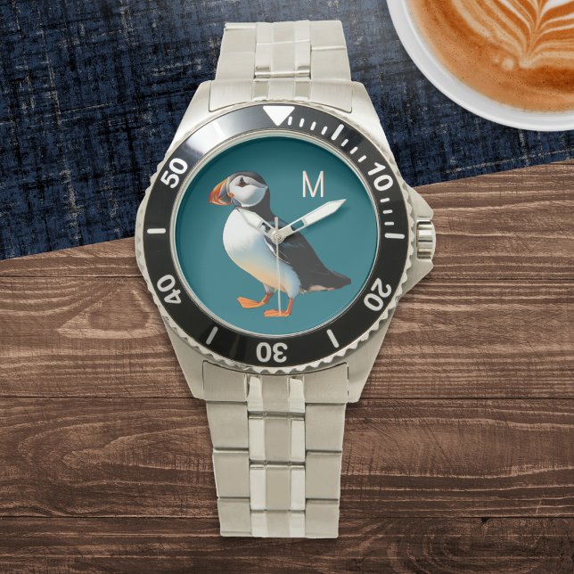 Monogramm des Bargelds Armbanduhr (A stylish monogrammed watch with Atlantic puffin picture on an ocean blue background)