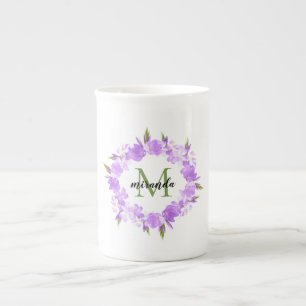 Monogramm eines Lila Blumenkornnamens Prozellantasse