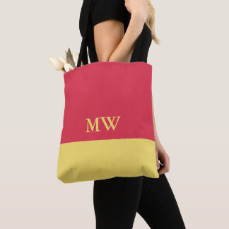 Monogramm-Farbblock-Tasche in Dunkelrosa und Gelb