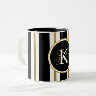 Monogramm für personalisierte schwarze und goldene zweifarbige tasse