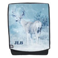 Monogramm für Winterhirsche und Kiefernbäume