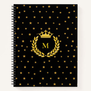 Monogramm, Krone, Lorbeer und goldene Sterne auf S Notizbuch