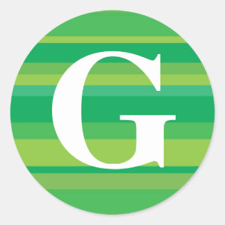 Monogramm mit farbenfroher Streifenunterlage - G Runder Aufkleber