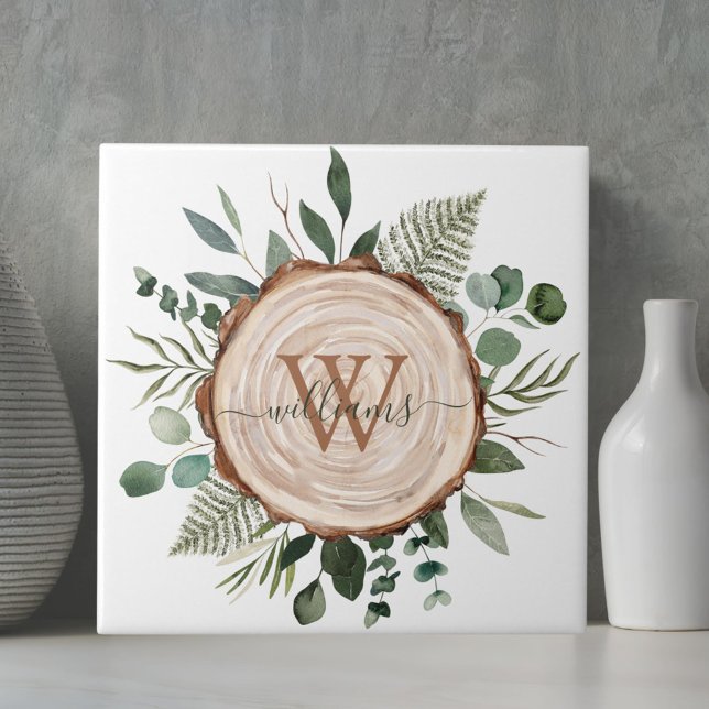 Monogramm-Wasserfarbe Rustikale Holzscheibe und La Fliese (Close up)