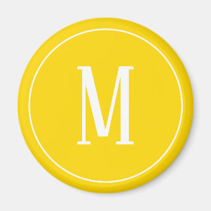 Monogramm-Weiß auf goldenem gelbem rundem Magnete