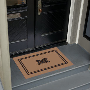 monogrammatisch braun und schwarz fußmatte