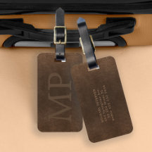Monogrammiertes Vintage-Braunleder sieht elegant a