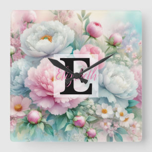 Monogrammname auf Aquarellfarben-Blume in Pastellf Quadratische Wanduhr