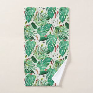 Monstera-Blätter und Palmen-Blätter auf Terazzo- Handtuch