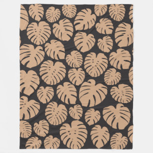 Monstera in Tan und Schwarz Fleecedecke