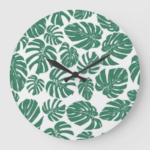Monstera verlasse nahtlos dekoratives Muster. Große Wanduhr