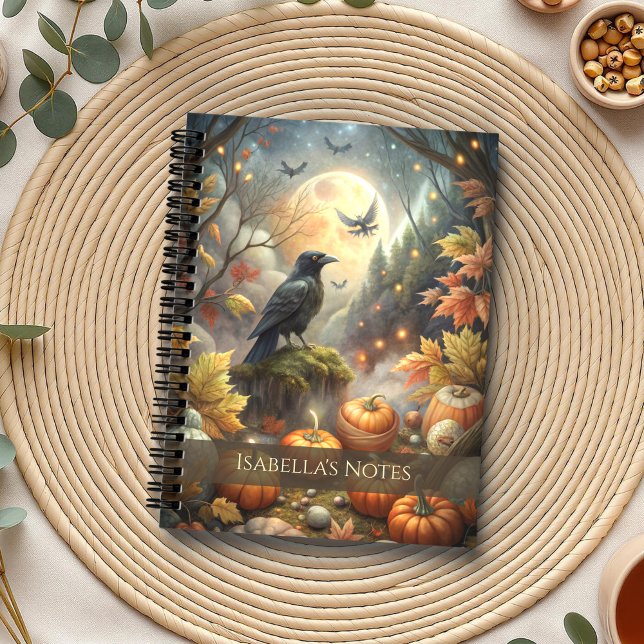 Moonlit Raven Magischer Herbstwald Notizbuch (Moonlit Raven Magical Autumn Forest Notebook on a boho table with eucalyptus and a cup of tea.)