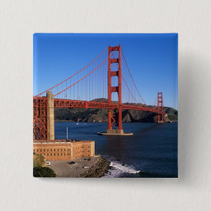 Morgenlicht badet die Golden Gate Bridge Button