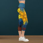 Mosaik Mandala Blume Gelb Blau und Rot Capri Leggings<br><div class="desc">Diese mosaikfarbene Kaleidoskop-Blume zeichnet sich durch brillante gelbe,  blaue und rote Fliesen aus. Es ist eine lebendige Geometrie,  die von Fraktalen,  Mandalasen und Buntglasmosaiken inspiriert wird. Holen Sie sich dieses trippige Design jetzt für Ihren Lieblingsfreund,  der leuchtende Farben Liebe!</div>