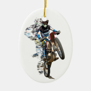 Motocross in der Wüste mit fliegenden Stücken Keramikornament