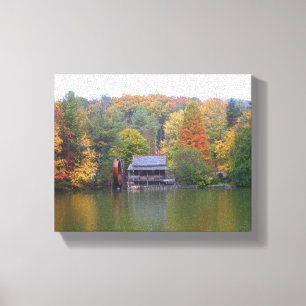Mühle auf einem See im Herbst Leinwanddruck
