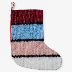Multicfarbene Stripwolle: Stoffgewebe. Kleiner Weihnachtsstrumpf