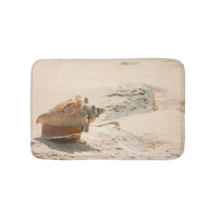 Muscheln auf dem Strand Badematte