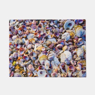 Muscheln durch das Seeufer Fußmatte