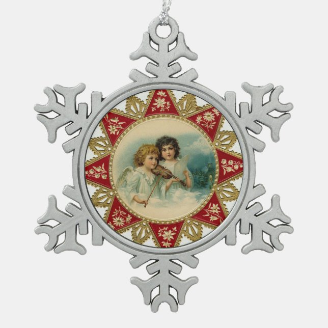 MUSIKANGELSTAR SCHNEEFLOCKEN Zinn-Ornament (Vorderseite)