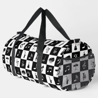 Musiknoten und Instrumente auf Quadraten Duffle Bag