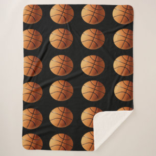 Muster aus orangefarbenen und schwarzen Basketball Sherpadecke