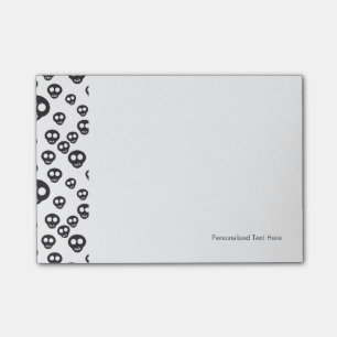 Muster mit schwarzen Schädeln auf weiß Post-it Klebezettel