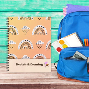 Muster Rainbows auf gelben Notebooks Notizbuch