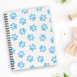 Muster von Pfoten, Hundeschäben, blaue Baby-Paws Notizblock