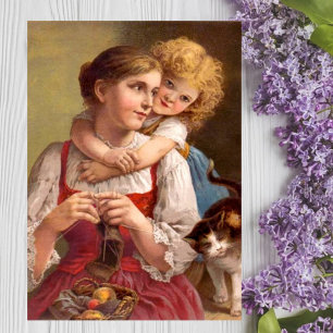 Mutter mit Kind und Katze kneten