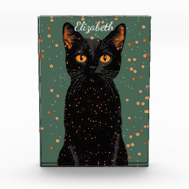 Mystische schwarze Katze mit orangefarbenen Augen Fotoblock