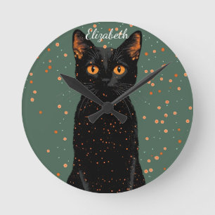 Mystische schwarze Katze mit orangefarbenen Augen  Runde Wanduhr