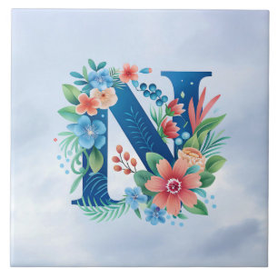 N blaues Monogramm mit Blume Fliese