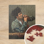Nach dem Stierkampf | Mary Cassatt Puzzle<br><div class="desc">Nach dem Stierkampf (1873) von Mary Cassatt porträtiert ein auffallendes Porträt eines Stierkämpfers, der sich nach seinem Kampf ruht, beiläufig eine Zigarette rauchen. Das Gemälde erfasst das Wesen des Charismas des Stierkampfes und den ruhigen, reflektierenden Moment, der der Intensität der Arena folgt. Cassatts detailliertes Pinselwerk und die Verwendung des Lichts...</div>