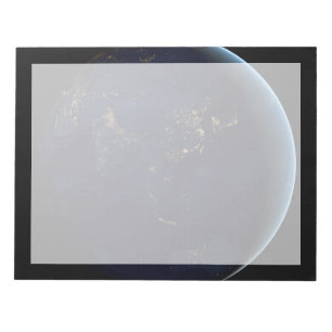 Nacht beleuchtet die Erdstadt in Asien und Austral Notizblock