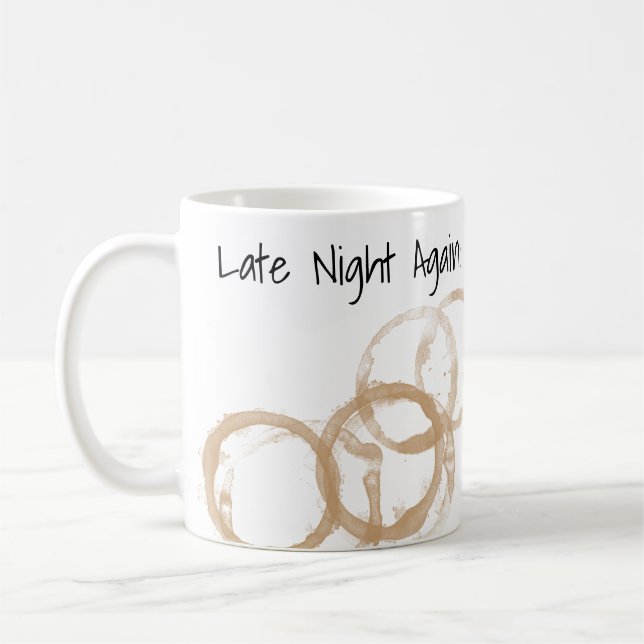 Nachts wieder kaffeeverkleidete Rings Kaffeetasse (Links)