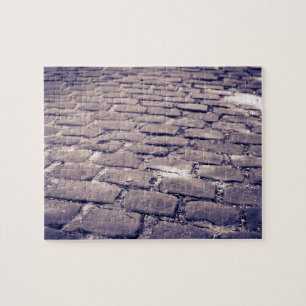 Nahaufnahme einer Kopfsteinpflasterstraße Puzzle