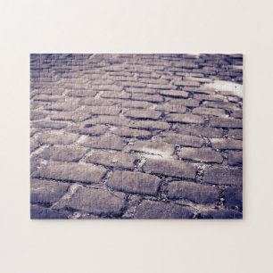 Nahaufnahme einer Kopfsteinpflasterstraße Puzzle