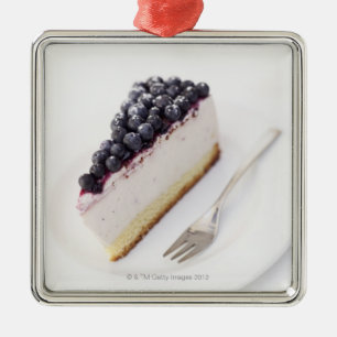Nahaufnahme einer Scheibe des Blaubeerkäsekuchens Ornament Aus Metall