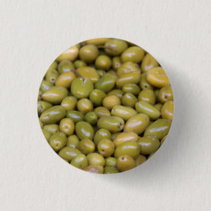 Nahaufnahme von grünen Oliven Button