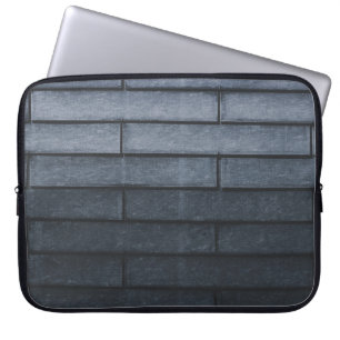 Nahe Mauer aus grauem Backstein Laptopschutzhülle
