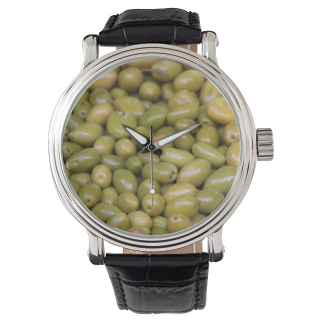 Nahes Aufsetzen grüner Oliven Armbanduhr (Vorderseite)