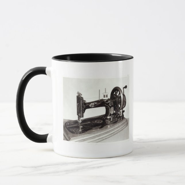 Nähmaschine der Sänger-"neuen Familie", 1865 Tasse (Links)