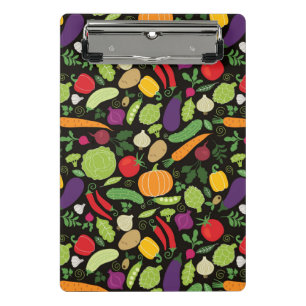 Nahrung auf einem schwarzen Hintergrund Mini Klemmbrett